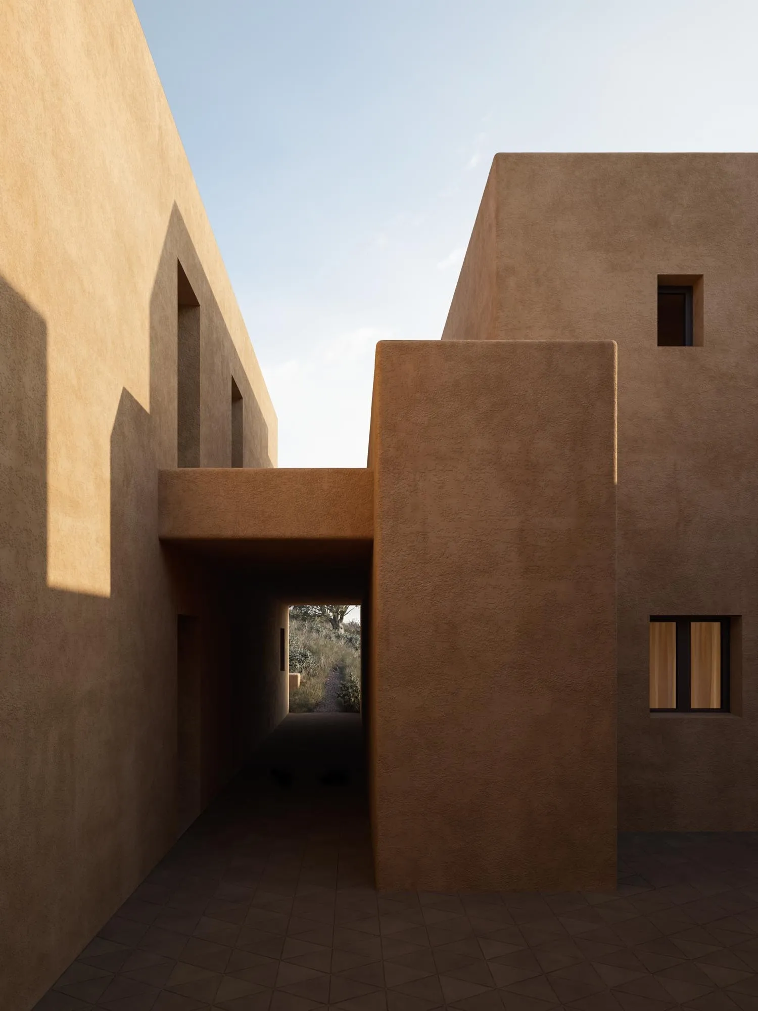 The earthen volumes and the passage between them