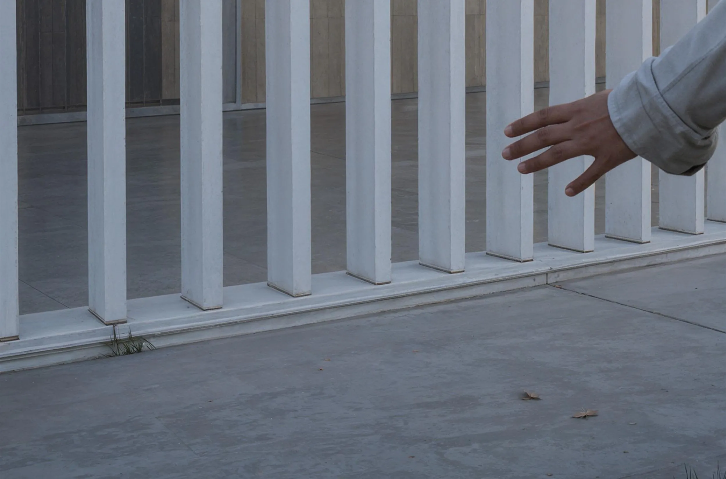 The colonnade with a hand reaching out