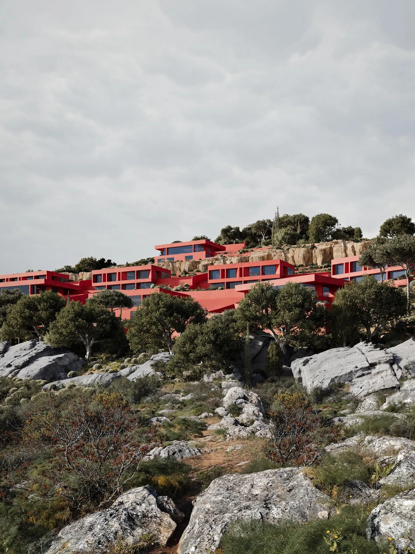The buildings on the rocks under a soft sky
