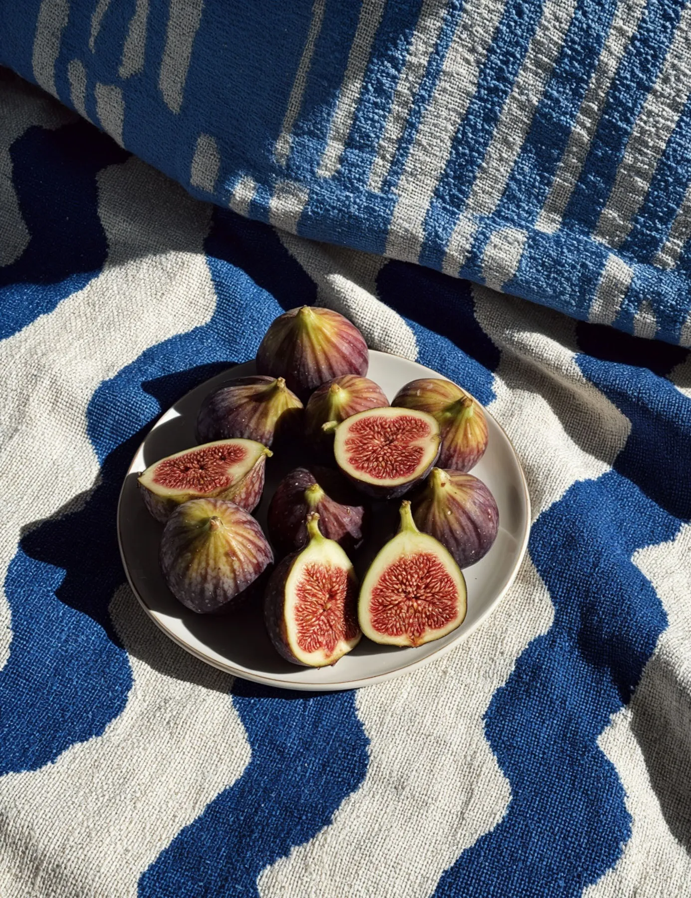 Figs on a blue and white towel