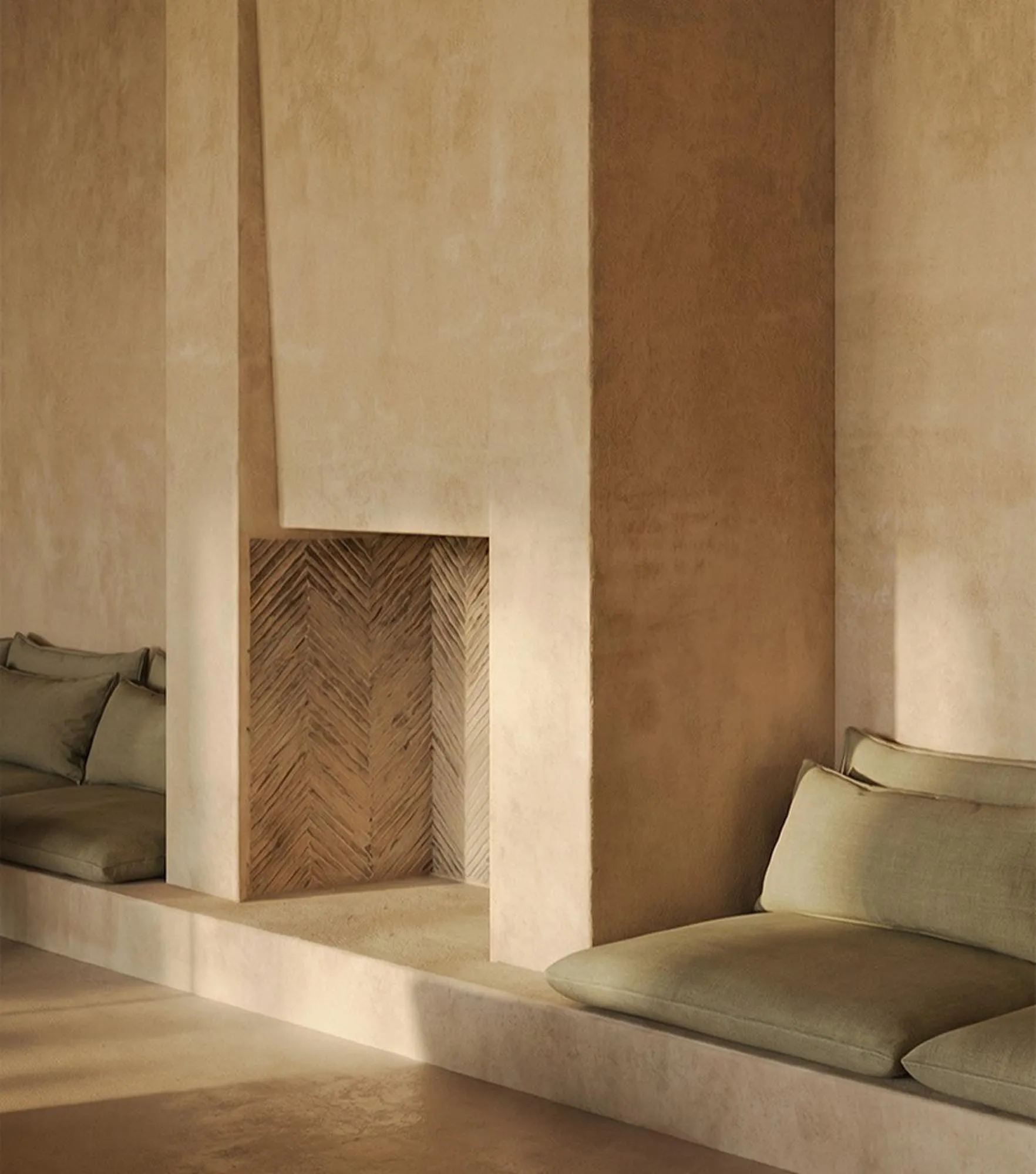 Fireplace lounge with green cushions