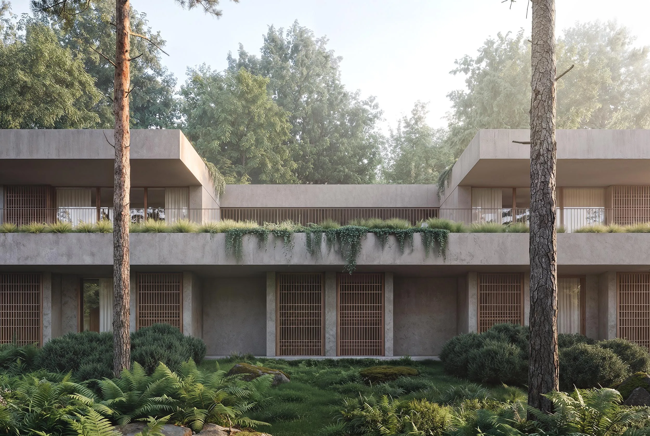 The house facade with balconies between the pines